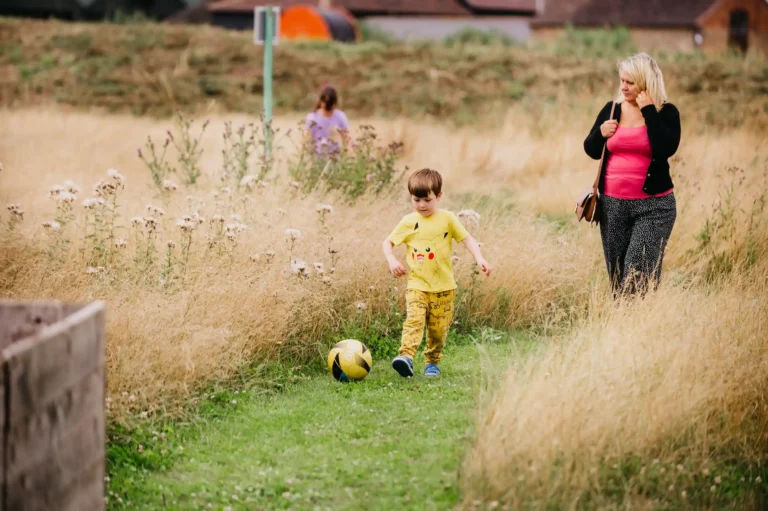 Boy playing foot golf